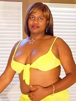 Ms Pleasure returns from the pool wearing her sexy yellow bikini that shows off her big black boobs and round firm ebony booty